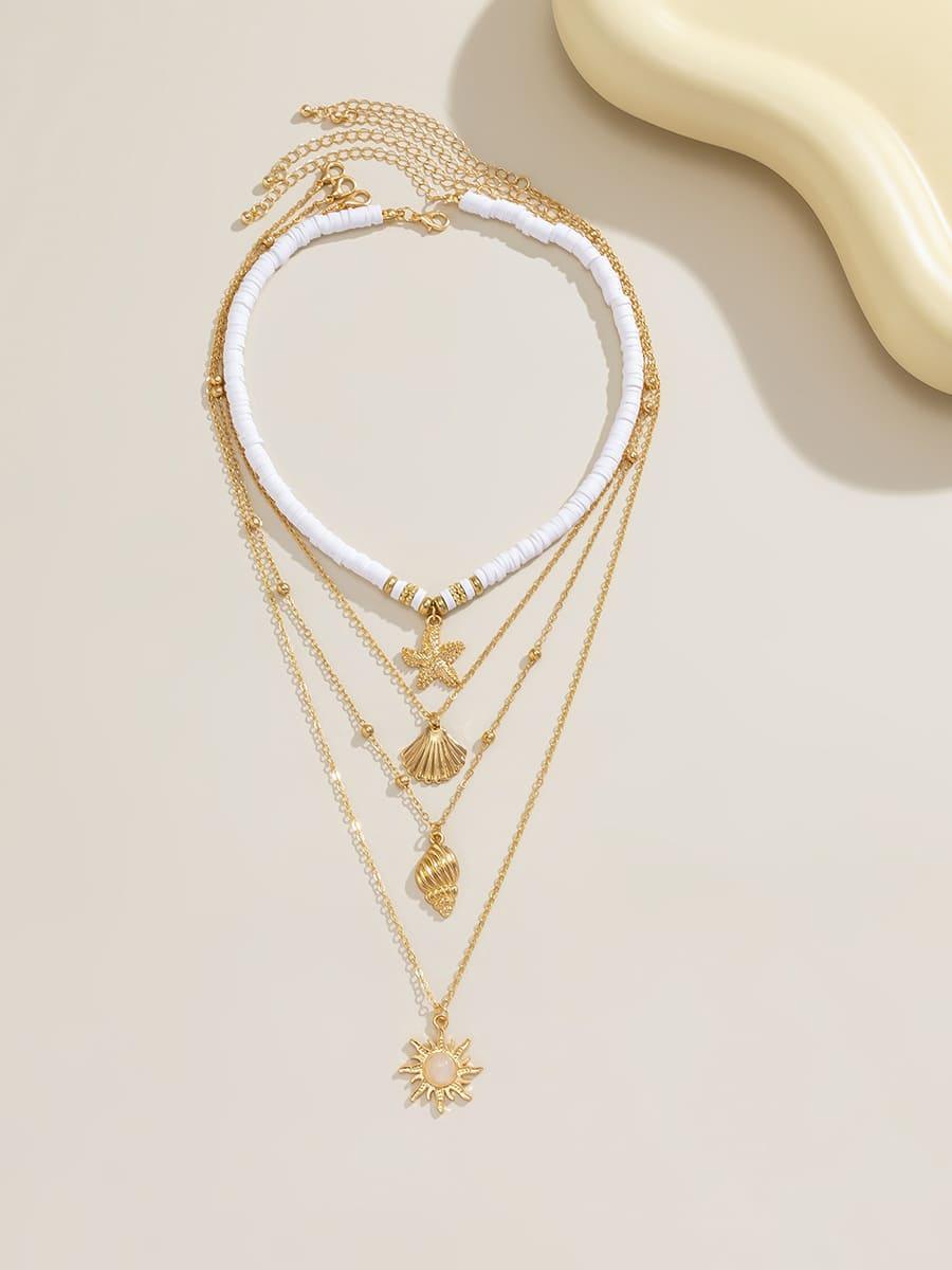 South Pacific Shell Starfish Necklace Gold