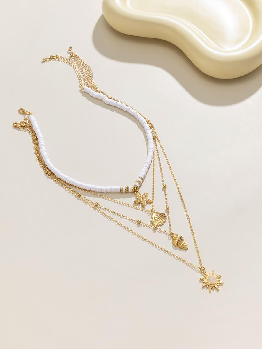 South Pacific Shell Starfish Necklace Gold