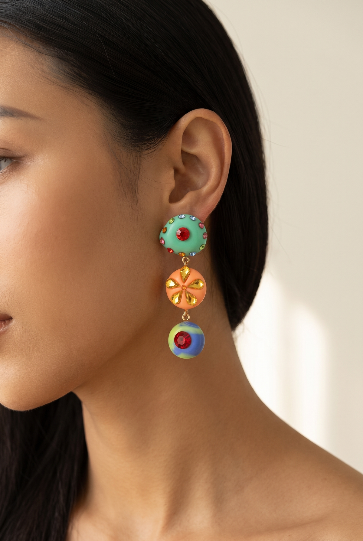 Model wearing the Wiola colored rhinestone drop earring